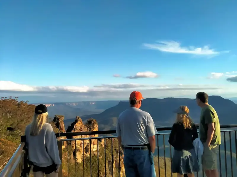 Visitors looking across the mountains